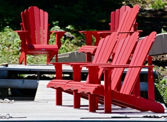 Six handsome red Muskoka chairs - bold and beautiful